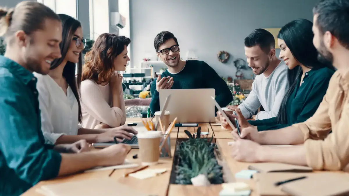 A leadership team running an engaging company town hall meeting